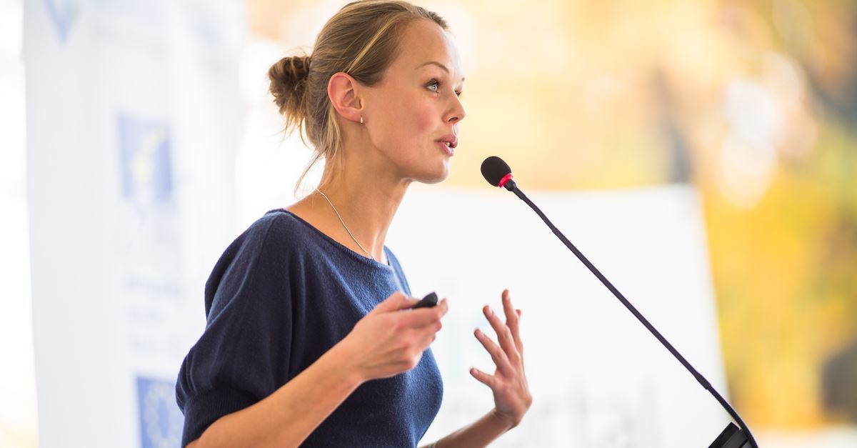 female pastor preaching