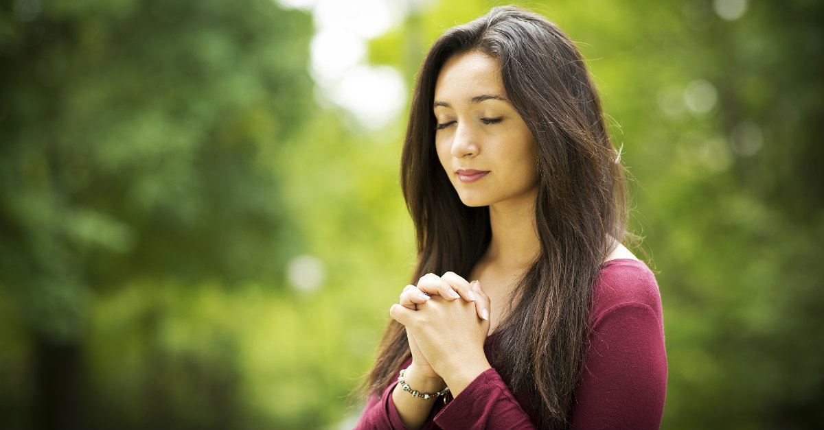 woman praying to jesus