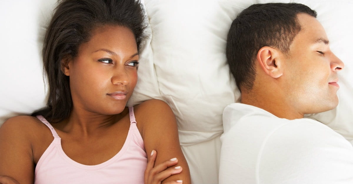 Angry couple in bed, stronghold of bitterness and unforgiveness
