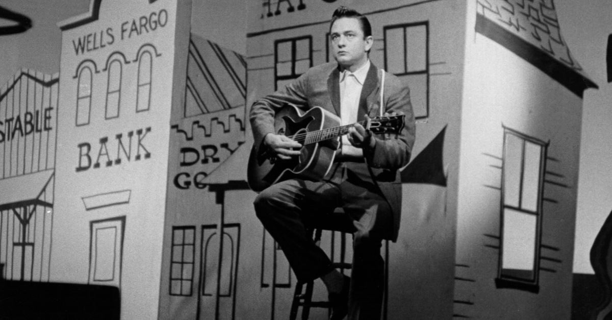 Johnny Cash performing on stage