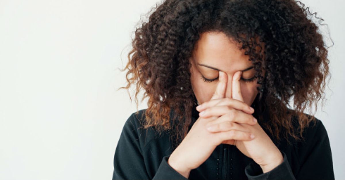 Woman praying, stronghold of anxiety