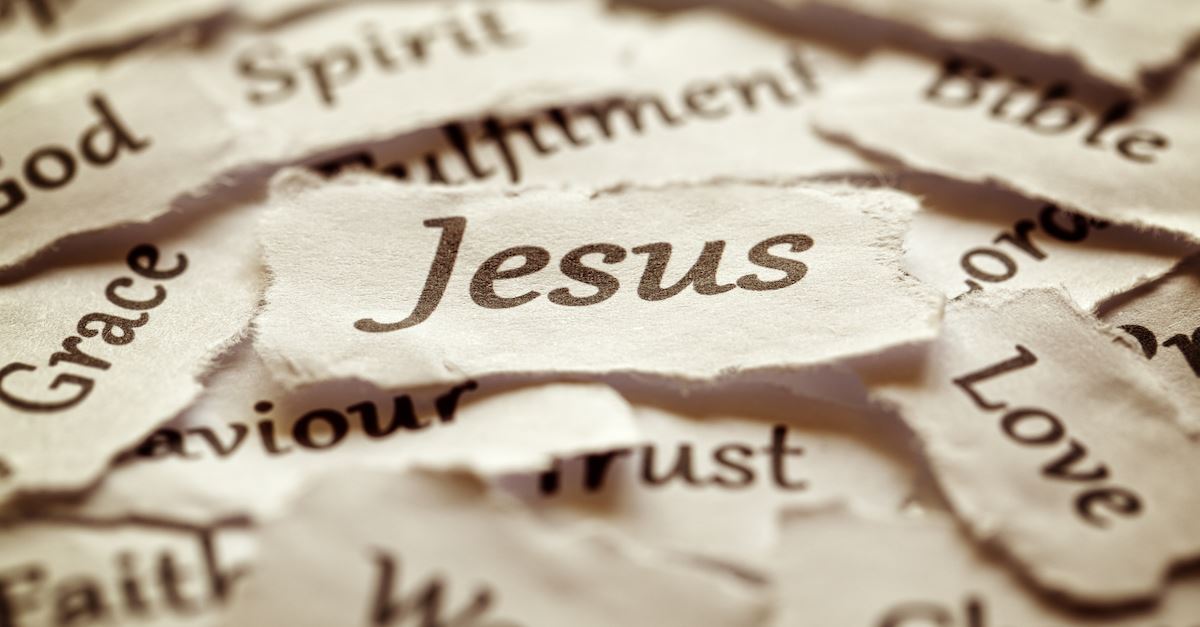 pieces of paper with words on them including Jesus, the name of Jesus