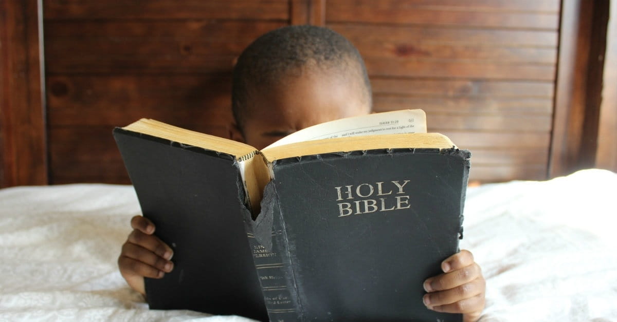 children explain christian bible child trinity jesus holy dad parents christianity he reading many boy teach another saying