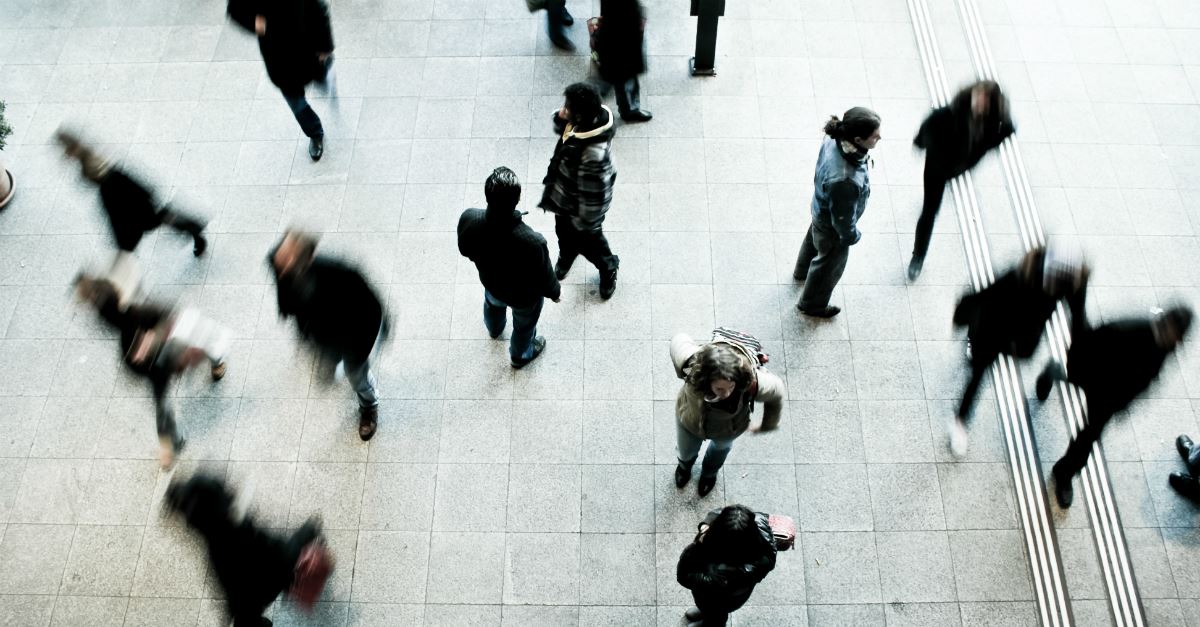 aerial view blur focus of people walking fast in different directions