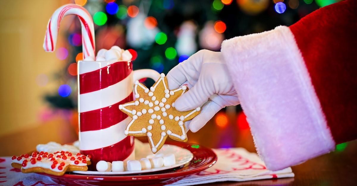 Santa's hand with cookies, reasons St. Nicholas would not want to be Santa