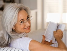 2041 woman older reading.220w.tn