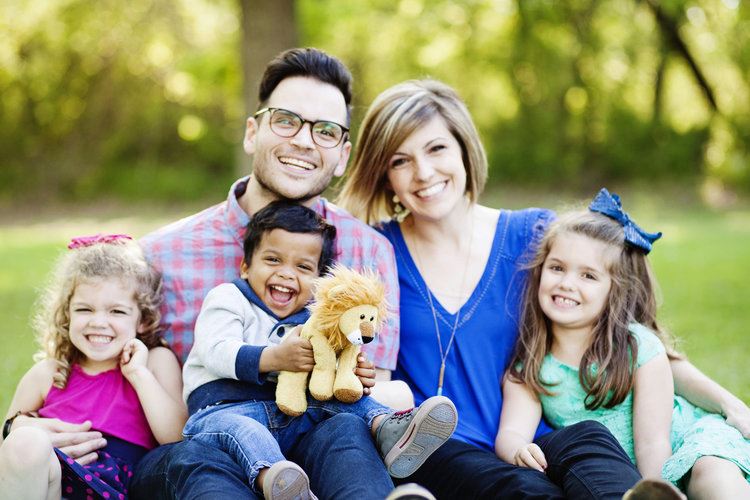 Kelly Needham, her husband Jimmy, and their three children