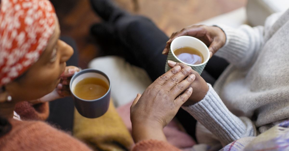 close up of women talking with tea, lessons from being vulnerable