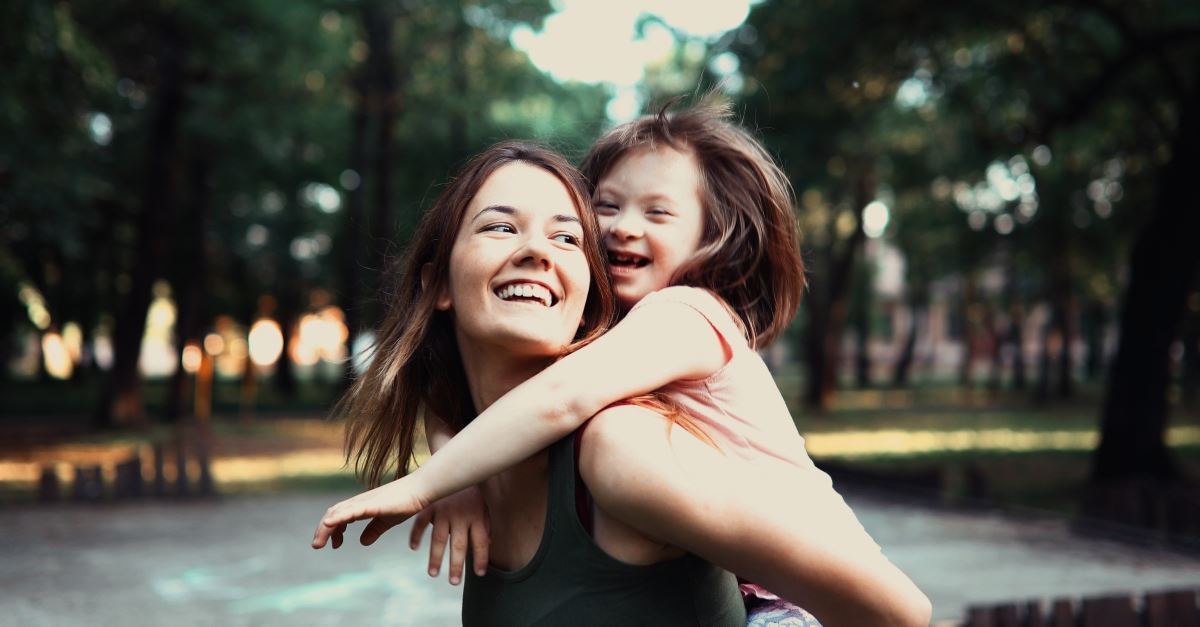 down syndrome daughter on mother's shoulders, birthday prayer to pray each year