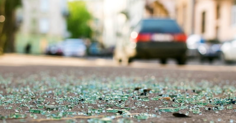Woman Prays over Infant Found in Crash Scene