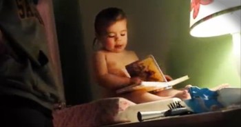 Adorable baby girl Lauren just loves reading her favorite story from her Children's Bible.  Let's give her a virtual high-five!