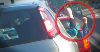 When two strangers were stuck in a traffic jam, they were caught doing the funniest thing to make time pass a little more quickly.  Check out their funny solution to turning an unpleasant event into an entertaining opportunity!