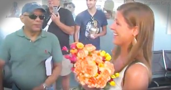 Complete Strangers Started Handing This Woman Flowers And She Had No Idea What Was Going On. But Just Wait!
