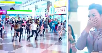 When his girlfriend stepped off the plane, she had no idea the amazingness that was about to happen. This guy just took flash mob proposals to the next level!