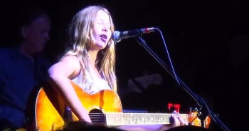 Molly Rae sang and played guitar with The Orange Blossom Opry House Band