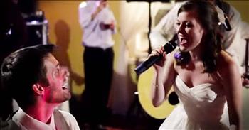 This bride wanted to do something extra special for her groom on their wedding day. So at their reception, she grabbed the microphone and started to sing ‘The Way I Am.’ What a sweet moment between husband and wife!