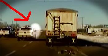 When Police Sargent Todd Volk got the call about an out of control tractor-trailer he jumped into action...literally! The truck's driver was having a seizure and was unconscious so Sgt. Volk sprinted across the highway and jumped onto the moving truck. You have to see this heroic rescue to believe it! 