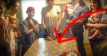 Before her last birthday on Earth, this mother received the most priceless gift of all. Her soldier son was hiding in a wrapped box and when she finally opens it...I love that face!