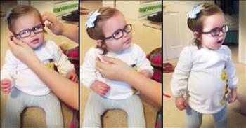 This sweet baby girl is getting her first pair of glasses at just 16-months-old and she's about to see her momma clearly for the very first time. And when you hear her reaction you're heart is going to skip a beat. 