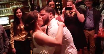 The Line-Up Choir had just finished a performance in Brooklyn when they went into a local bar to relax. And when they met newlyweds Carmine and Yasmine this chorus knew they wanted to do something extra special for the couple. This rendition of 'Crazy Love' is the perfect first dance!