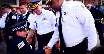 Alex Jr. was just 3 weeks old when his father, Officer Alex Valadez Sr., was killed on duty. Today, Alex Jr. is graduating from kindergarten and members of the Chicago Police Department, where his father worked, decided to come out and show their support. What a beautiful moment!