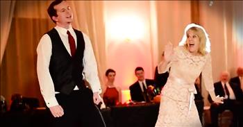 This groom and his mother completely stole the show with their epic reception dance. Just look at these two bust a move together. And wait til the end for the best surprise yet!