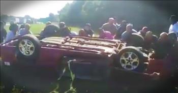 When these drivers saw a convertible flip off the road pinning the driver they knew they had to help. And seeing how they rallied together to flip his car is beyond incredible! God bless these men!