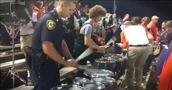 The Heritage High School marching band welcomed a surprise guest during a recent performance. Police officer Ronnie Coleman joined the band for a talented display of drum skills. Wow!
