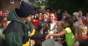 Jeff Petrie, a teacher at a Wisconsin middle school, is battling lymphoma. He has not been able to go back to work, so he was going to miss the big homecoming parade. That's when the students decided to bring the parade to him and showed up on his front lawn for this incredible surprise. What a beautiful moment to witness!