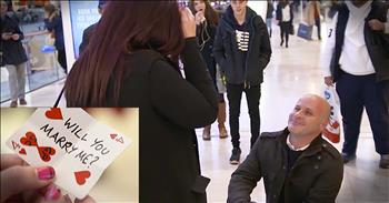 When it came time for Gavin Pepper to pop the question to his girlfriend, Stephanie Cunningham, he knew exactly what he wanted to do. He enlisted the help of a magician and placed him at the shopping center where the couple would be. And when you see Stephanie's face when she reveals the words on her card...what a sweet engagement!