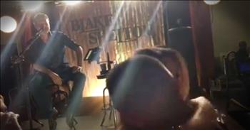 Blake Shelton was giving a concert when he noticed a man in the front row getting down on one knee.When Blake realized that a proposal was happening, he stopped everything to share in this special moment! Of course she said 'yes', and Blake even played the couple a special song. How sweet is this?