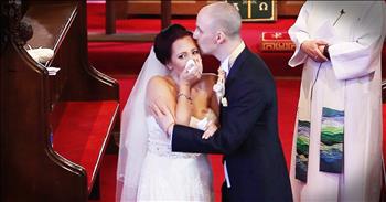 Liz is a musical theatre teacher who adores her students. Her fiancé Ollie knew how much it would mean for her students to be part of their wedding day. So with the help of the students and her fellow teachers Ollie organized for the kids to sing one of the songs Liz had picked for the ceremony as a big surprise. And when you see the look on this Bride's face when she hears voices and turns to see her students your heart will feel so full! Oh my stars how beautiful is this surprise. 