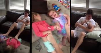 This dad may not have 8 hands but he can still feed the baby and play with his two older kids. And seeing how this dad has all his kids happy at one time will put the biggest smile on your face. This dad's got it all under control.