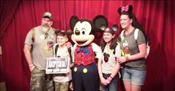 Courtney and Tom Gilmour have been raising siblings Janielle and Elijah for the past three years. Recently, the whole family decided to take a trip to Walt Disney World for a very special reason. The kids thought they were just going for fun, but Courtney and Tom had something bigger and better planned. 

They wanted to surprise the kids and tell them they were officially going to be adopted. Courtney and Tom decided to get Mickey Mouse in on the surprise, so they booked a meet and greet in advance to meet Mickey. 

When the kids posed for a picture, the adoption was revealed with a cute sign saying, "Your Adoption Day" with the date written on it. 

When the park noticed what they were celebrating they made sure to capture the moment on video. What a beautiful moment that no one will ever forget. 
