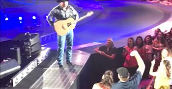 Country artist Garth Brooks is known for his kind-hearted nature and love towards his fans. Just watch as Garth stops ones of his recent concerts when he notices a couple in the crowd with a sign. 

Garth called the couple down to the stage and found out that they were expecting their first child and wanted him to help reveal the gender. Garth is a father himself so he shared a few pieces of wisdom before opening up the envelope containing the baby's gender. 

I just love how excited this country superstar was to welcome this bundle of joy and watching the pure happiness on this couple's face made my day.