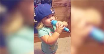 2-year-old Maddy Dellaca loves to stand up and sing for her country. Just listen as this sweet toddler sings her own special rendition of 'The Star-Spangled Banner.' 

I'm in awe that she remembered so many of the words as the belted out into the children's microphone. And at the very end when she wanted to sing it again, my heart leapt in my chest. 

What a precious moment all caught on camera. I sure hope this little cutie continues to sing her heart out! 
