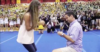 The students at Lassiter High School in Marietta, Georgia, thought it was going to be just a normal pep rally. Little did they know that one of their teachers, Robbie Galvin, about about to propose to his girlfriend, Sydney Wright. 

Robbie and his fellow teacher were participating in a lip dub and Sydney had showed up watch. While Robbie was singing, the music suddenly stopped and changed to Bruno Mars' hit 'Marry You.' That's when the crowd of over 2,000 high schoolers started to go wild. 

Robbie grabbed Sydney's hand and led her onto the floor as he continued his serenade. And when he got down on one knee, Sydney wasn't the only one cheering. What a special memory for this beautiful couple. God bless their marriage and future together!