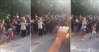 Sgt. Paul Tuozzolo, a police officer with the 43rd Precinct of the NYPD, passed away in the line of duty last year. Paul was a beloved coworker and family man. 

This year, Paul's son Austin is starting kindergarten. Since Austin's father cannot be there to send him off, dozens of officers from Paul's department came to help Austin onto the bus. This incredible showing of support and compassion truly shows us the beautiful part of humanity. 

I'm so glad everyone could come together and give this young boy a great start to the school year. This will absolutely be a moment he never forgets. 