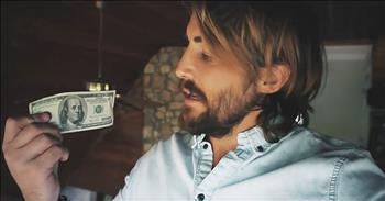 Clayton Jennings is a Christian father and motivational speaker. In this clip, he takes a crisp, clean $100 bill and starts to crumple it up. But no matter what he does to the money, it's still worth exactly the same amount. 

The image that is pressed upon that money is what gives the currency it's worth. Many people think that they are too damaged for God to love them or that their past sins are too great. God loves you no matter what. Just like the money, you can be crumpled and flawed, but you are still worth so much in the eyes of the Lord. 

Rest your sins and worries on His shoulder and amazing things will start to happen in your life. What a great reminder!