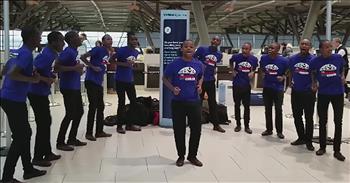 It's easy to become overwhelmed when you're traveling during the holiday season. Airports are always busier and people are hustling from stop to stop without paying much mind. 

That's when the Kenyan Boys Choir decided to brighten up some traveler's day at Ottawa Macdonald-Cartier International Airport. Right at the WestJet check-in counters, these talented men formed a circle and started to sing. They even pulled out their instruments to really make this an unforgettable performance. 

I love hearing the travelers cheer in excitement and encourage these men to continue singing. It's truly an incredible impromptu concert and it's something I'd love to see in person. 

Showing love to strangers is one of the greatest ways to show people the same love Christ showed when He was on earth. What a loving way to surprise some very stressed out holiday airport passengers during their travels.