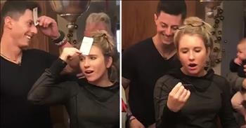 Marriage proposals are always exciting, especially when it is a surprise to the bride. And it's even better when family and friends get to be included without them knowing what is going on either. That exactly the idea that this guy had when he decided to pop the question to his girlfriend. 

Just watch as he pretends to do a magic trick with cards. He has everyone gather around a table and gave each person a card. Then, they had to hold up their card in front of their forehead on the count of three. Everyone else had an ordinary card, but his future fiancé had a very special one. Before the game began, he wrote a special message on the card that was just for her. 

And when the cards were revealed, everyone exclaimed how her card was so different. “This is not fair!”, she said and then she flipped the card and read out loud, “Will you marry me?” When she turned around, her sweet guy was down on one knee, with a ring in hand. She did not hesitate to say yes! This was such a sweet moment and I'm so glad it was all caught on camera!