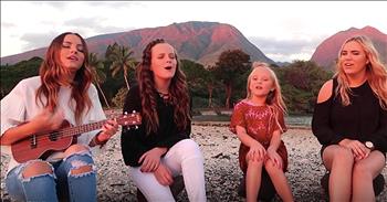 These 4 talented sisters were visiting Hawaii when they decided to grab their ukulele and sing. Just watch as they sit against the most beautiful backdrop and start to sing a stripped down rendition of 'Somewhere Over The Rainbow.' 

I always love hearing this song and listening to these sweet voices is absolutely amazing. I've heard so many renditions of this classic tune but I love when singers take away all of the special effects and let their harmonies shine. When you truly listen to these lyrics, your heart will feel warm. These 4 sisters picked the perfect song to showcase their vocal talent and when all of their voices blend together, it's truly a beautiful moment. 

I'm so glad that these girls decided to sing this special song and that they caught it all on camera. It's truly a beautiful location with even more beautiful voices. What do you think of these talented sisters? I sure hope we see more performances like this!