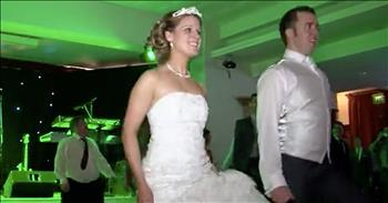 When this bride and groom decided to tie the knot, they knew they wanted to make their wedding extra special. This two were both lead dancers and traveled the world with the original Riverdance production. When they thought about their wedding reception, they knew a lot of fellow dancers would be in attendance so they came up with a brilliant plan. 

Just watch as the groom leaps onto the floor and starts to get the crowd going. You can see other dancers surrounding the floor and soon, the bride and others join in on the fun. I always love watching Riverdance. It takes so much talent and skill to pull off those incredible dance moves and it never ceases to amaze me. 

I can hear the excitement from the audience and I know this is a special performance that they won't forget. What an amazing surprise. I'm so glad they caught everything on camera and they can watch this again and again.