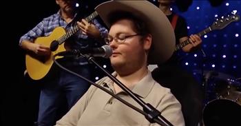 16-year-old Jared Watson took the internet by storm when a video of him singing 'I Told You So' by Randy Travis at a talent show went viral. Jared is confined to a wheelchair with spinal muscular atrophy but that doesn't stop him from following his dreams of performing. And one listen to his amazing voice and you'll understand why everyone is going crazy over this young man. 

His talent show performance even caught the eye of Randy Travis himself. Mary David Travis, Randy's wife, wrote to Jared and said 'Mary David Travis wrote: ‘Jared, you covered Randy’s song beautifully! Just want you to know Randy teared up when he listened to it this afternoon.' That's a big compliment coming from a country music legend like Randy Travis. 

Now, Jared is continuing to take his music career to new heights as he performs his new song ‘In The Name Of Freedom.' What an incredible performance. I can't wait to hear what Jared does next!