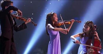 The Little Stars String Trio is a talented group of three siblings. Dustin, 11, Starla, 10, and Valery, 8, Breshears make up this talented ensemble and they love playing their string instruments for all to hear. 

Their cello and violin performances have been seen all over the world and today, they're sitting down with Steve Harvey and showing him what they got on The Little Big Shots stage. But this performance isn't your normal classical number. This trio has taken the famous theme song to the movie "E.T. the Extra-Terrestrial” and given it a string makeover. 

Just listen as they beautifully perform this arrangement and give new meaning to this famous tune. I just can't get over how talented these kids are and they are definitely putting everything that they have into this performance. Who else is in awe of all that talent?