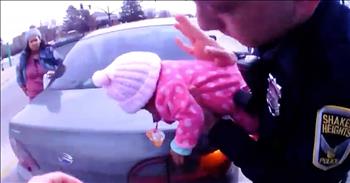 When a woman’s 2-month-old baby started choking while she was driving, she started to panic. Officers had stopped to help the disabled vehicle when the realized that the situation was more emergent than they thought. Every moment is captured on the police body camera and it's absolutely heart-stopping to watch. 

The little girl's body was lifeless, and the mom wasn't sure what to do. So, she quickly handed to baby over to the waiting officers and they turned her around to try and open up the airway. You can hear the officers talk back and forth giving each other advice while they call the situation in for an ambulance. 

Thankfully, after a few good pats, this poor baby's airway was cleared and she started to breathe on her own again. I know that this mother must've been so realized to know that her baby was going to be okay. Thank goodness that these police officers were in the right place at the right time. God bless our heroes in blue. 