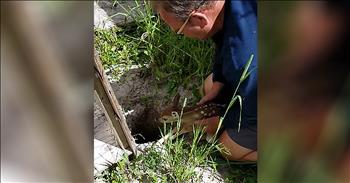 Kevin was building carport for his vehicles when he dug a small hole in the ground that would be filled with concrete. The next time Kevin went outside, he heard an animal noise and it sounded like something was in distress. 

When he investigated, he found a fawn that had fallen in the hole. He called the Montana Fish Wildlife and Parks, but ultimately, it was left up to Kevin to save the poor deer. He thought his granddaughter would like to see the rescue, so he handed his phone to a friend and they caught every second of this on camera. Just watch as Kevin reaches down and gently brings the fawn to the surface. 

I'm sure this sweet little deer was so scared to be alone and away from their mother. Thankfully, just minutes after the rescue, the fawn started bleating and the momma came running. They were able to reunite and now this fawn is safe with his mother in the wild. Thank goodness for the kindness of this man!
