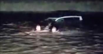 It was an incredible day when two brothers rescued an elderly woman whose vehicle was sinking in a body of water. Seth and his brother, Matt was traveling home when they saw a sinking vehicle. 

A 61-year-old lady was traveling ahead of Seth and Matt when she drove through a puddle and lost control of her vehicle. She ended up sliding into a portion of the highway that was flooded with water. The waters were deep and her car started sinking. 

Thankfully, she was able to get out of her vehicle through the passenger window and climb onto the roof. The brothers did not see her slide but as they approached that end of the highway, they noticed that the vehicle was slowly sinking. They assumed that someone probably escaped the vehicle, but they wanted to be sure they no one was trapped. So they turned off their truck so that they can hear if anyone was screaming for help. And sure enough, they heard a voice coming from the vehicle, crying out in distress. 

By this time, the vehicle was almost fully submerged with the water rising up to the windows of the car. That is when Seth dove into the body of 30-degree water to swim to the car and help. Matt turned the truck back on so that the headlights would light the way for Seth. And Seth was able to rescue the lady from the roof and helped her swim to their truck. They gave her a warm blanket and even drove her home safely. Thank God these kind men were there to help!