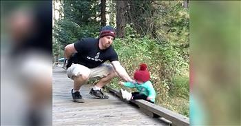 Dads have this uncanny sense of when something is about to go wrong. This is especially true when it comes to their young children. When danger is around, most fathers can prevent it in the most incredible way. 

For example. take this dad and his daughter in the woods. It looks like they are getting ready to pose for a picture on a small bridge. Dad is ready to go but as the little girl backs up, she takes one step too far. She is about to go over the edge when Dad quickly grabs her arm and pulls her to safety. 

This scary moment was all captured on camera and I'm so glad that these 'dad skills' kicked in. This cute little girl has no idea the danger she was in as she walks up to the camera laughing. Thank goodness for this dad save!