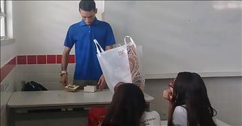 Bruno Rafael Paiva is a student teacher in Brazil who has currently been living at the school and not receiving a salary. It's been two months since Bruno has been paid, as he's been filling in for a teacher on maternity leave and all the paperwork has not gone through yet. But this amazing teacher is so passionate about his students and giving them an education that he has continued to teach through it all. 

When the kids heard about their teacher's struggle, they knew that they needed to do something to help him out. So they decided to pool their money together and present Bruno with an incredible gift. 

They left the surprise on his desk and waited for him to walk into the school on day as they kept a camera rolling. Bruno wrote on Facebook that "I had a surprise that was really not prepared. It's gonna be two and a half months that I teach, and I haven't even received the first salary yet. Teacher life is not easy." 

He was overcome at emotion for this incredible gesture and now the whole world is getting to know this selfless teacher. I'm so proud of these students for giving back to this incredible role model.